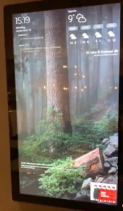 High-end 27-inch wall-mounted touchscreen monitor for full smart home system management.