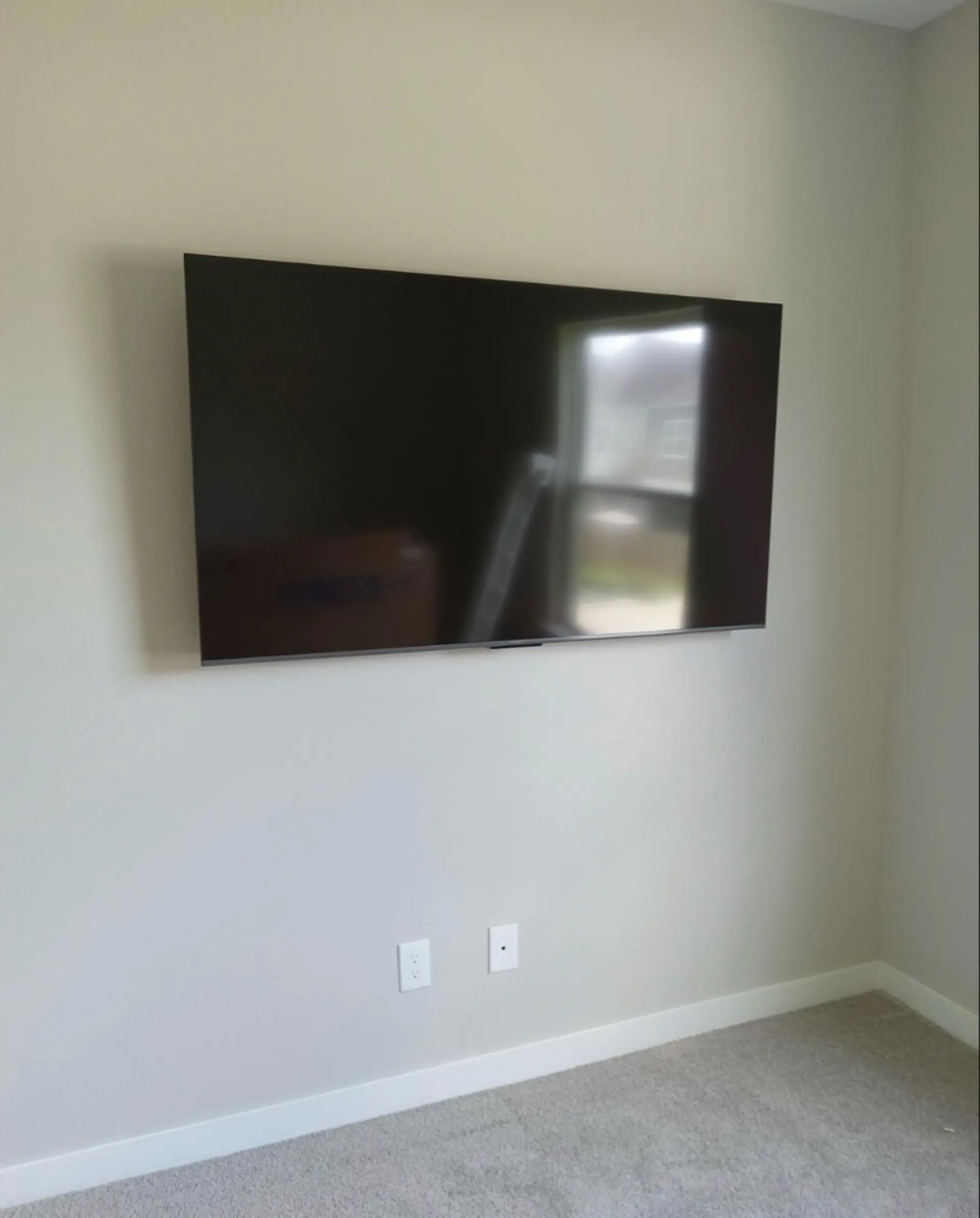 Living room TV wall mount service including professional cable concealment for a high-end look.