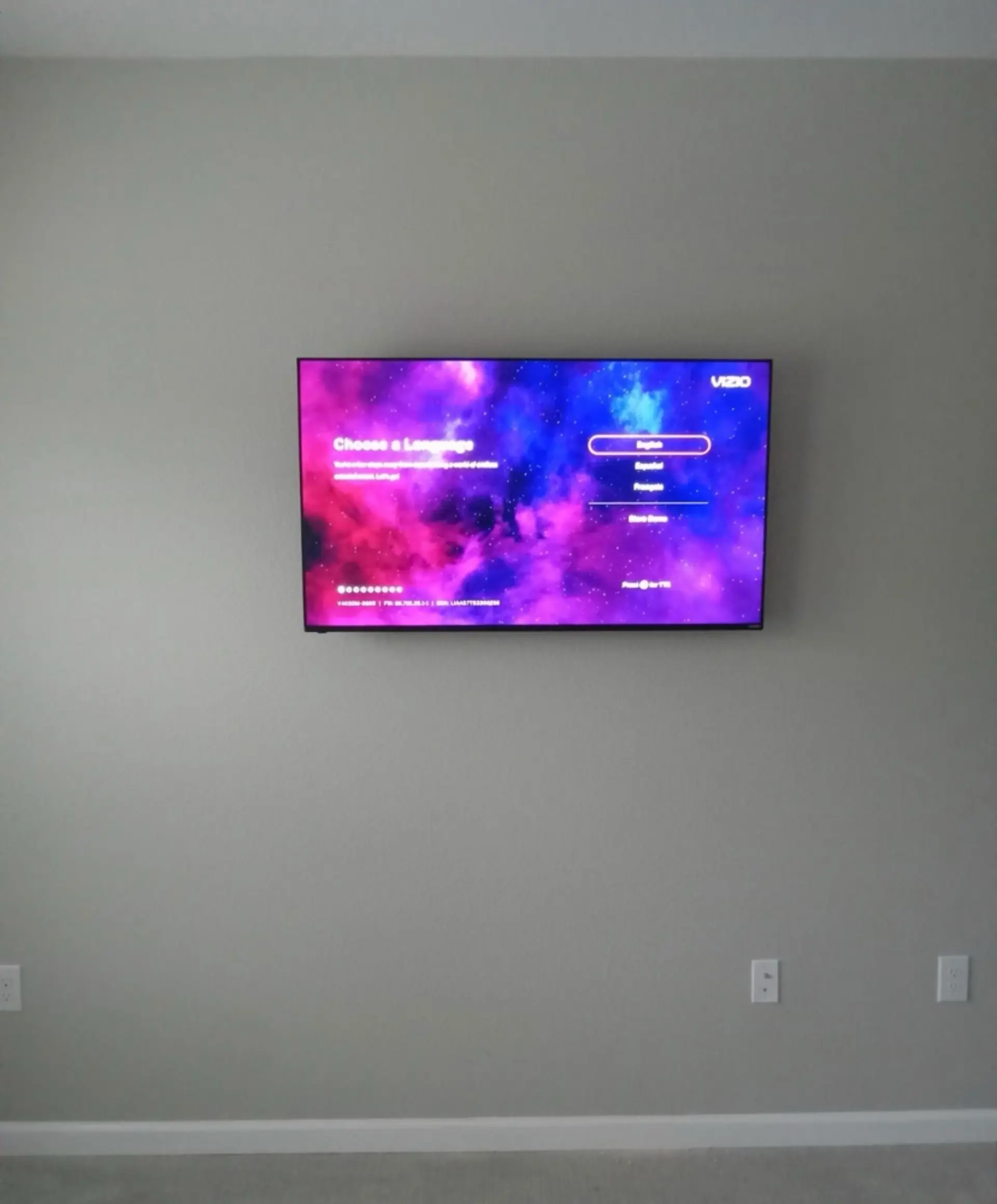 Living room TV wall mount service including professional cable concealment for a high-end look.