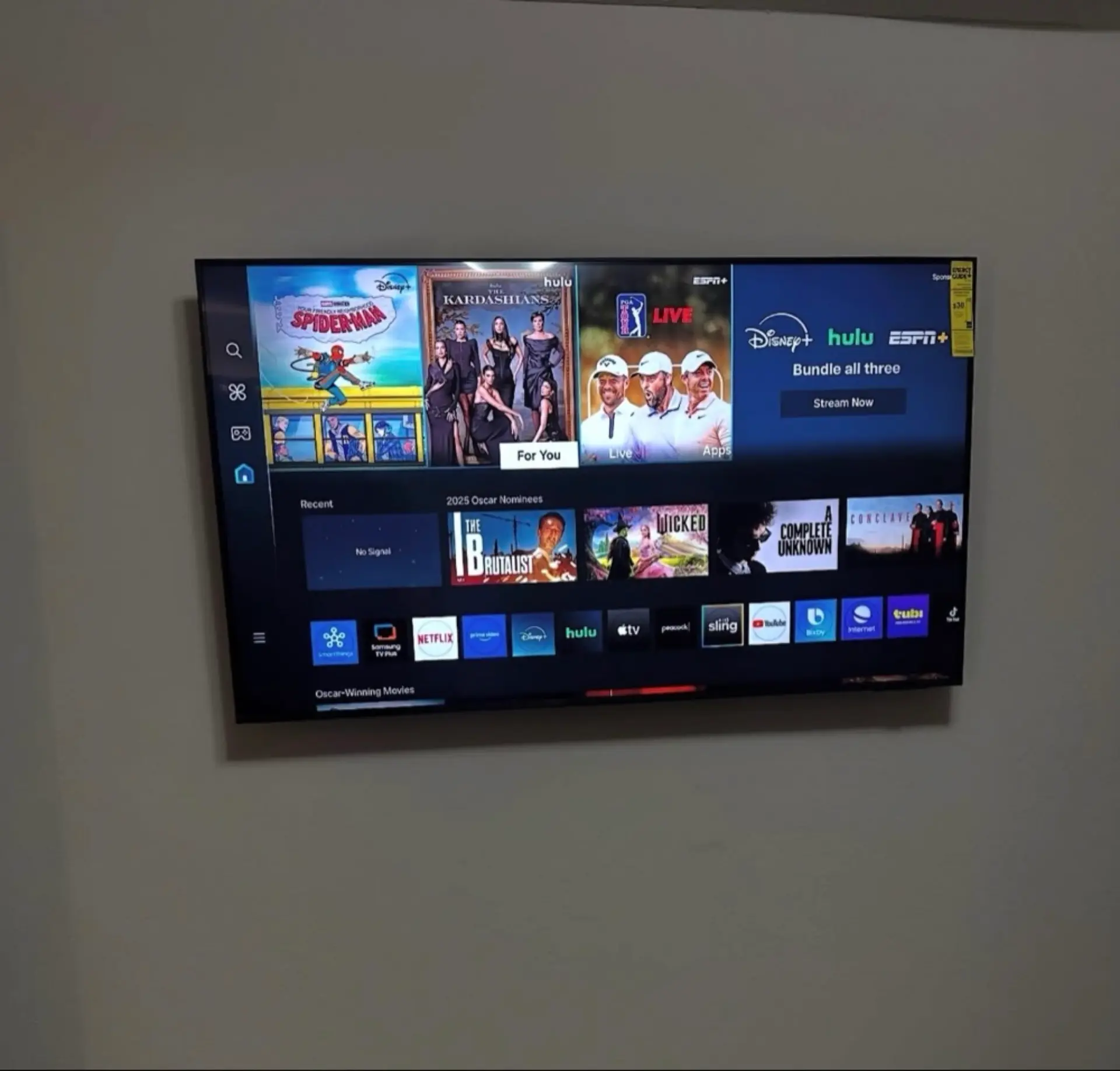 Residential TV wall mount setup with recessed cable routing for a sleek, clutter-free look in Richmond, TX.