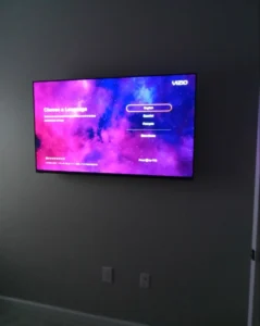 Professional flush-mount TV installation ensuring a flush-to-wall finish for high-end home interiors.