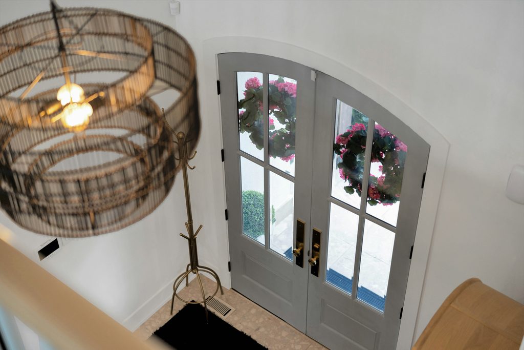 Front entry of a home lit at dusk